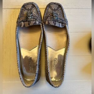 Gray snakeskin Michael Kors flats. Gently used, in great condition.